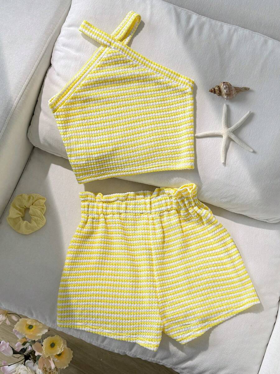 Tween girl 2-piece casual outfit set featuring a solid beige knit halter sleeveless top with belted detail and matching shorts.