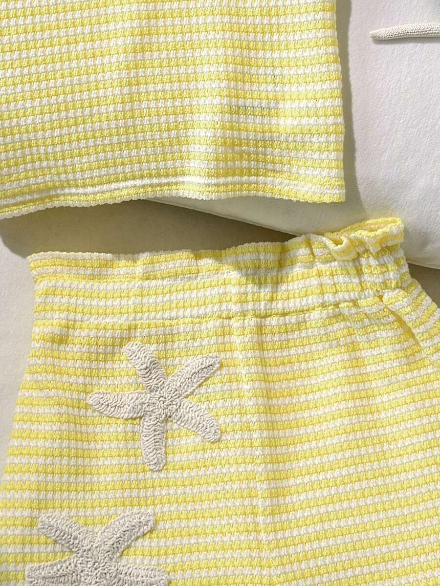 Tween girl 2-piece casual outfit set featuring a solid beige knit halter sleeveless top with belted detail and matching shorts.