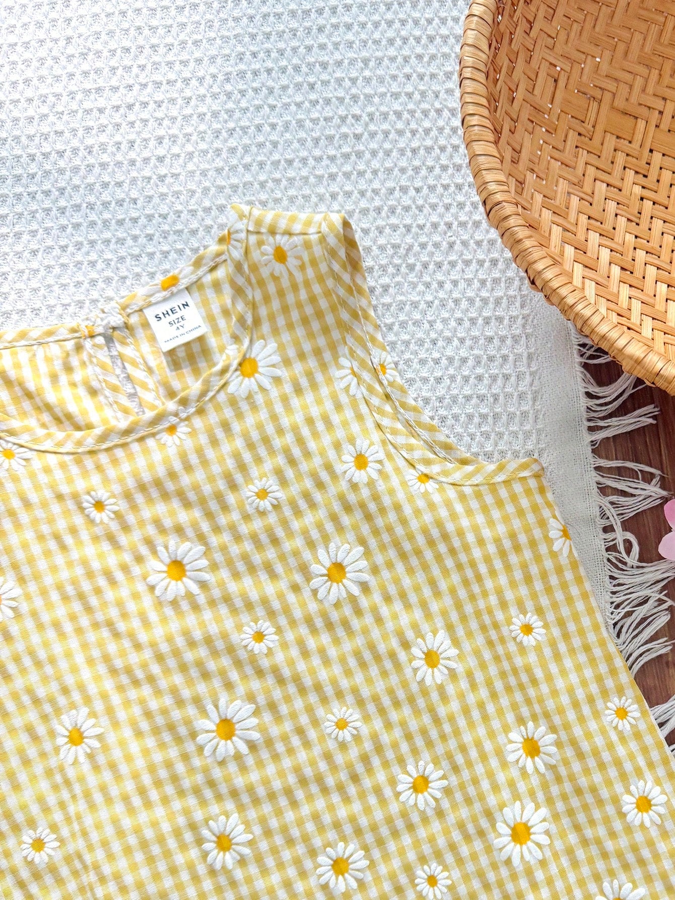 Tween girls sleeveless halter tunic dress with colorful rainbow striped colorblock pattern, button detail, short length, and regular fit for summer vacation or beach wear.