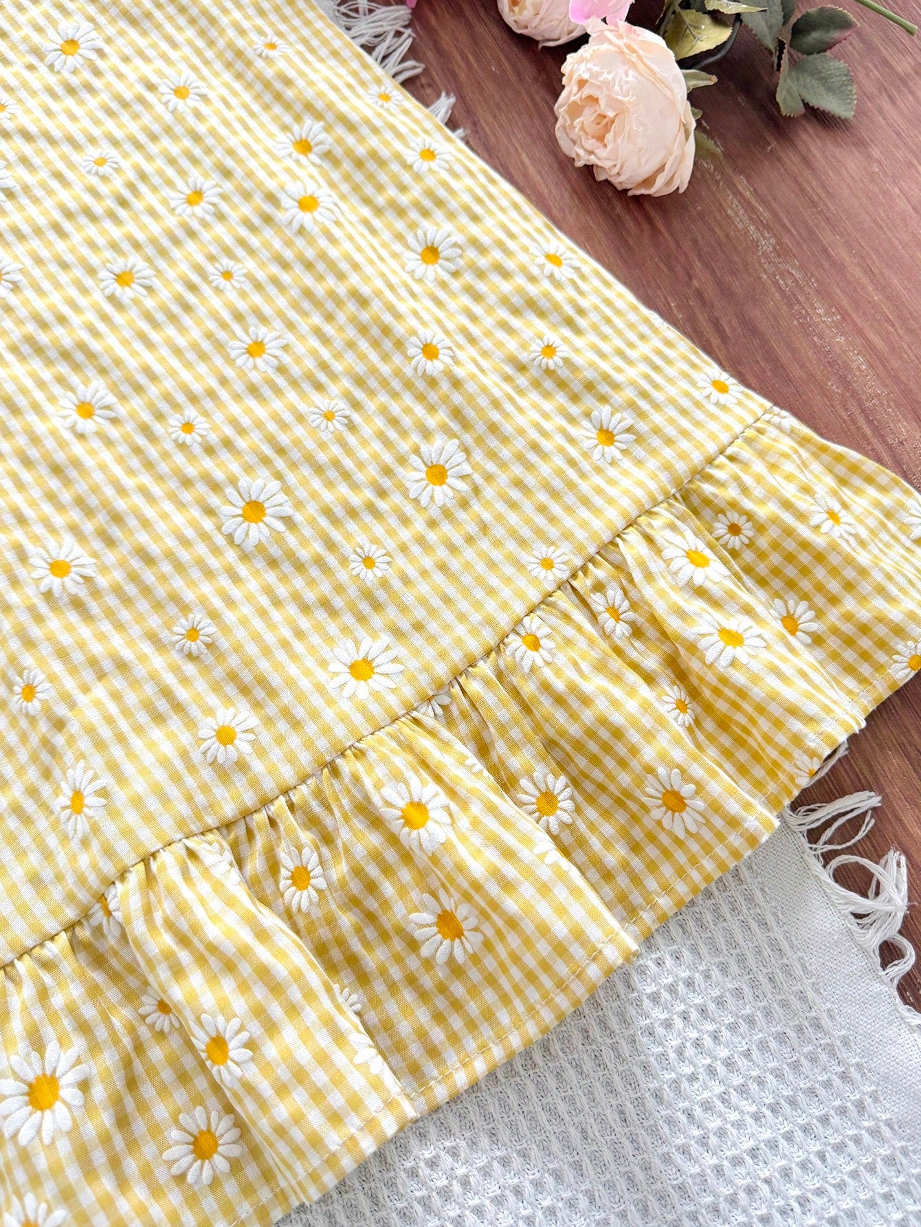 Tween girls sleeveless halter tunic dress with colorful rainbow striped colorblock pattern, button detail, short length, and regular fit for summer vacation or beach wear.