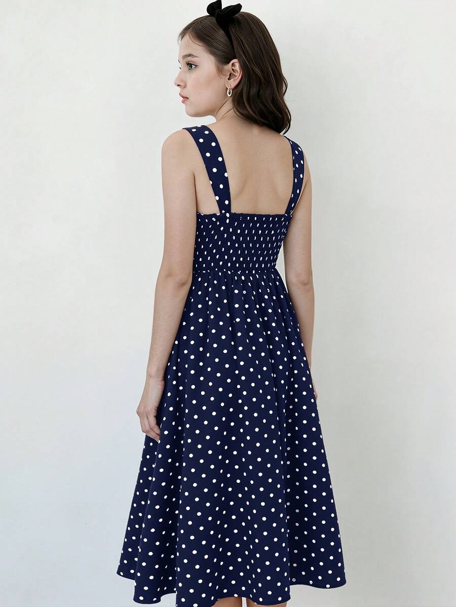Tween girl apricot floral print midi dress with ruffle shoulder straps, shirred detail, and high waist A-line fit.