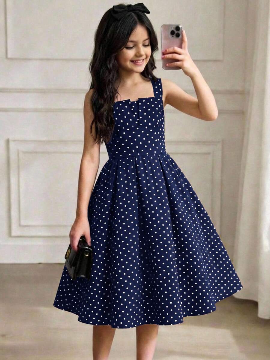 Tween girl apricot floral print midi dress with ruffle shoulder straps, shirred detail, and high waist A-line fit.