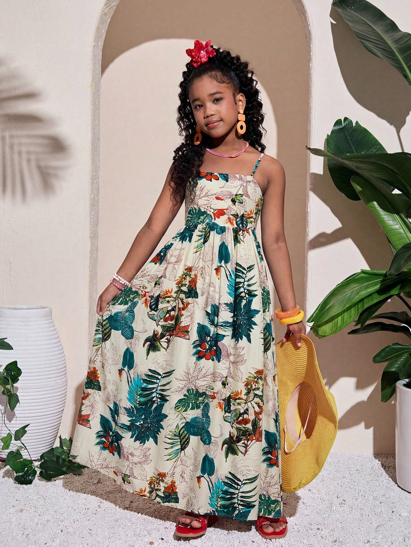 Tween girls striped spaghetti strap cami dress with high waist, shirred detail, zipper closure, sleeveless design, and flared long A-line silhouette for vacation wear.