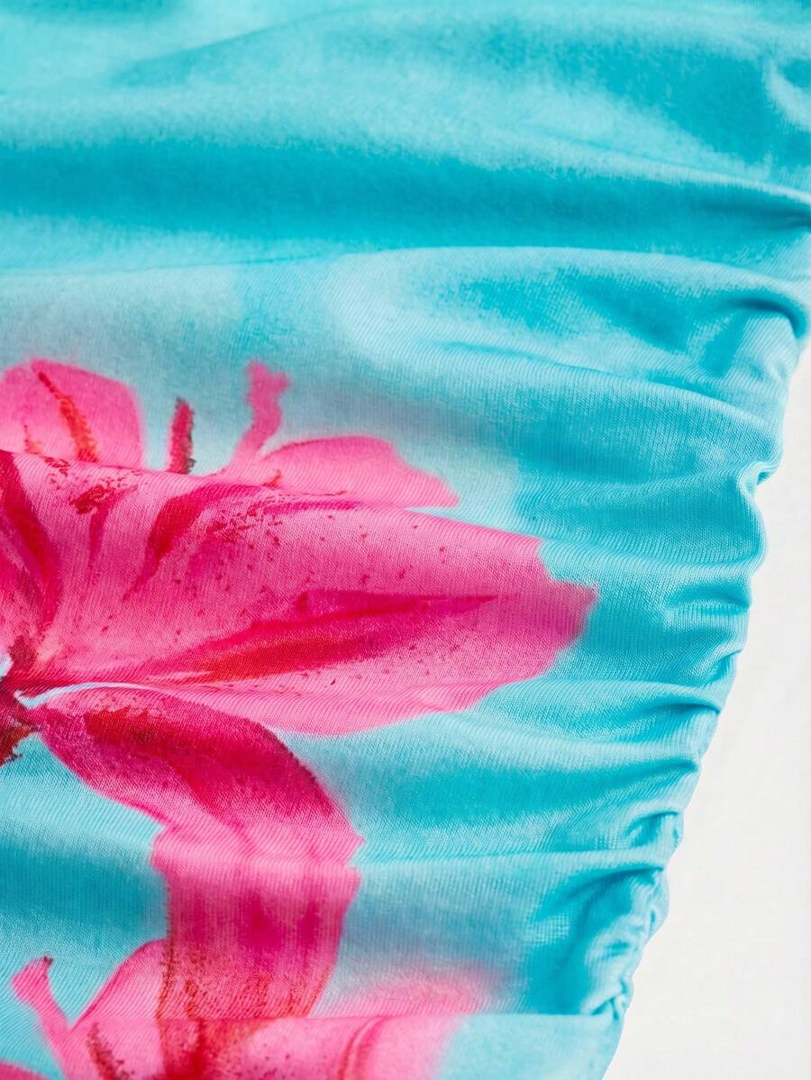 Tween girls multicolor floral print sleeveless halter midi dress with slit, slim fit, strapless neckline, zipper detail, and vacation beach style.