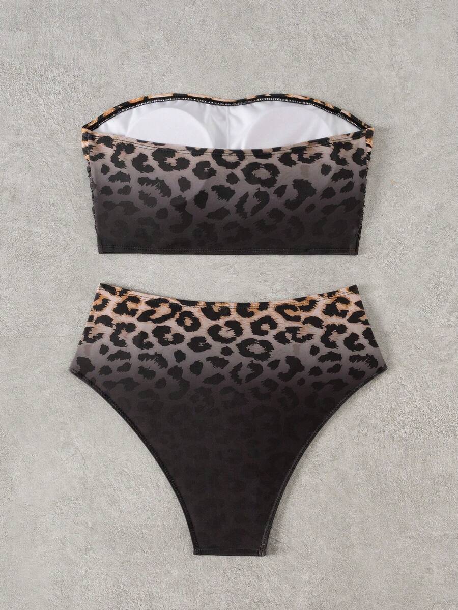 Women's black strapless ruched bandeau bikini top with high waisted bottoms