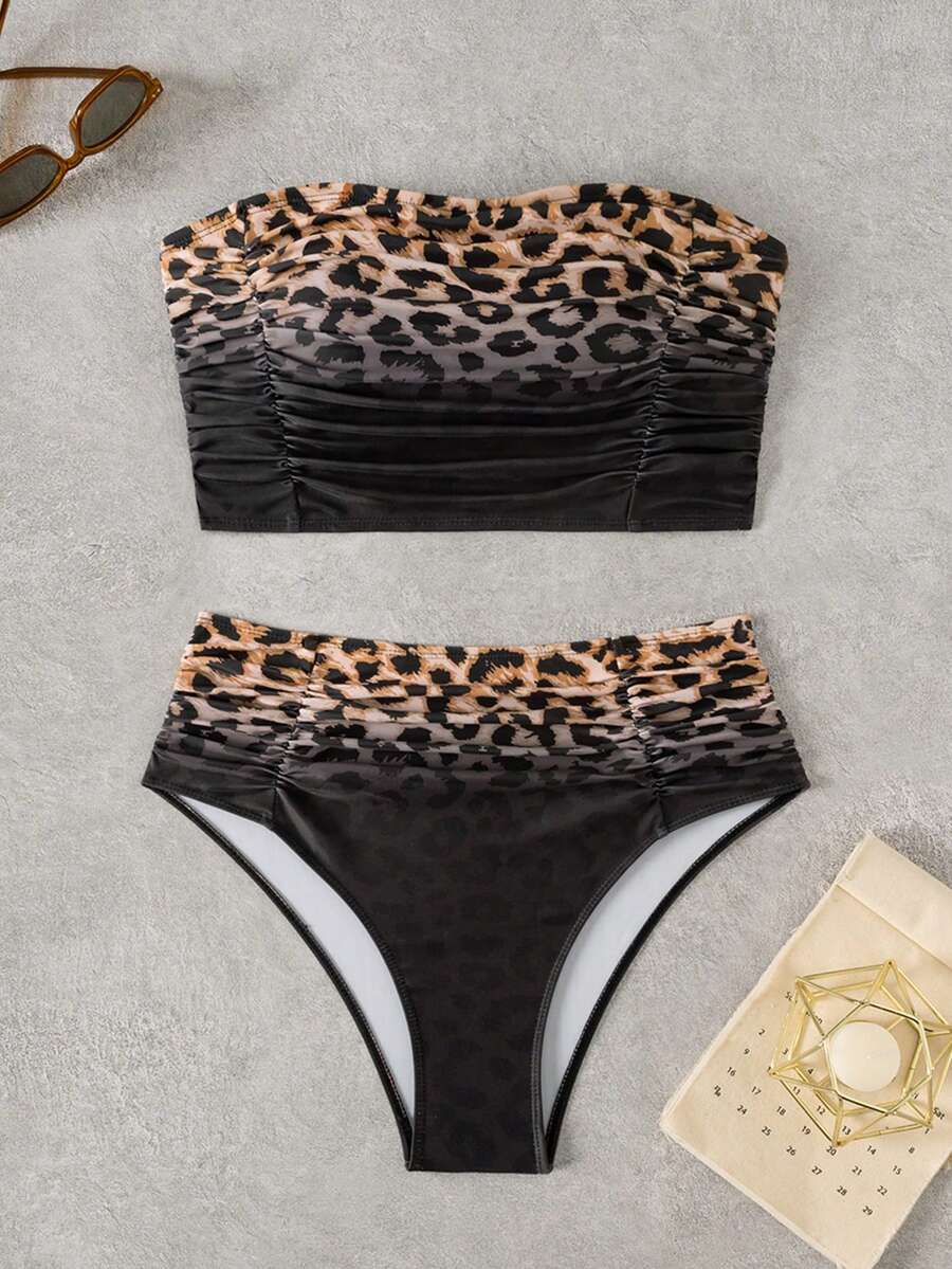 Women's black strapless ruched bandeau bikini top with high waisted bottoms
