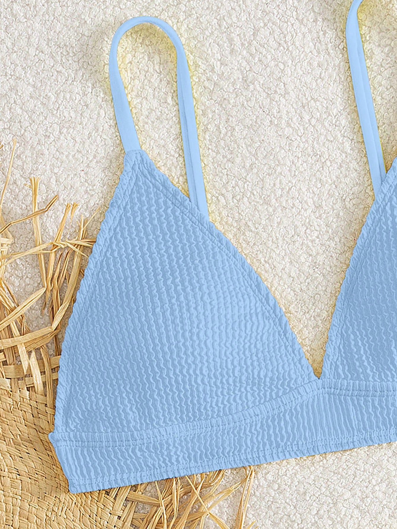 Tween girls two-piece bikini swimwear set with a solid color textured design, spaghetti strap top, wireless bra, and mid-waist lined bikini bottoms.