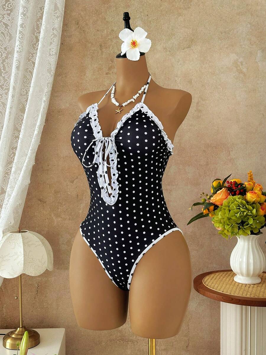 Multicolor floral print women's bikini swimsuit set featuring spaghetti straps, wireless lined bra with removable padding, backless lace-up design, and high cut bottom.