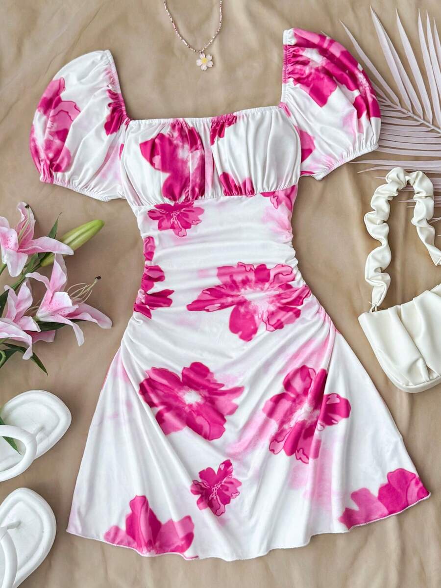 Teen girls red floral print A-line party dress featuring short puff sleeves, square neckline, ruched bust, and contrast lace details.