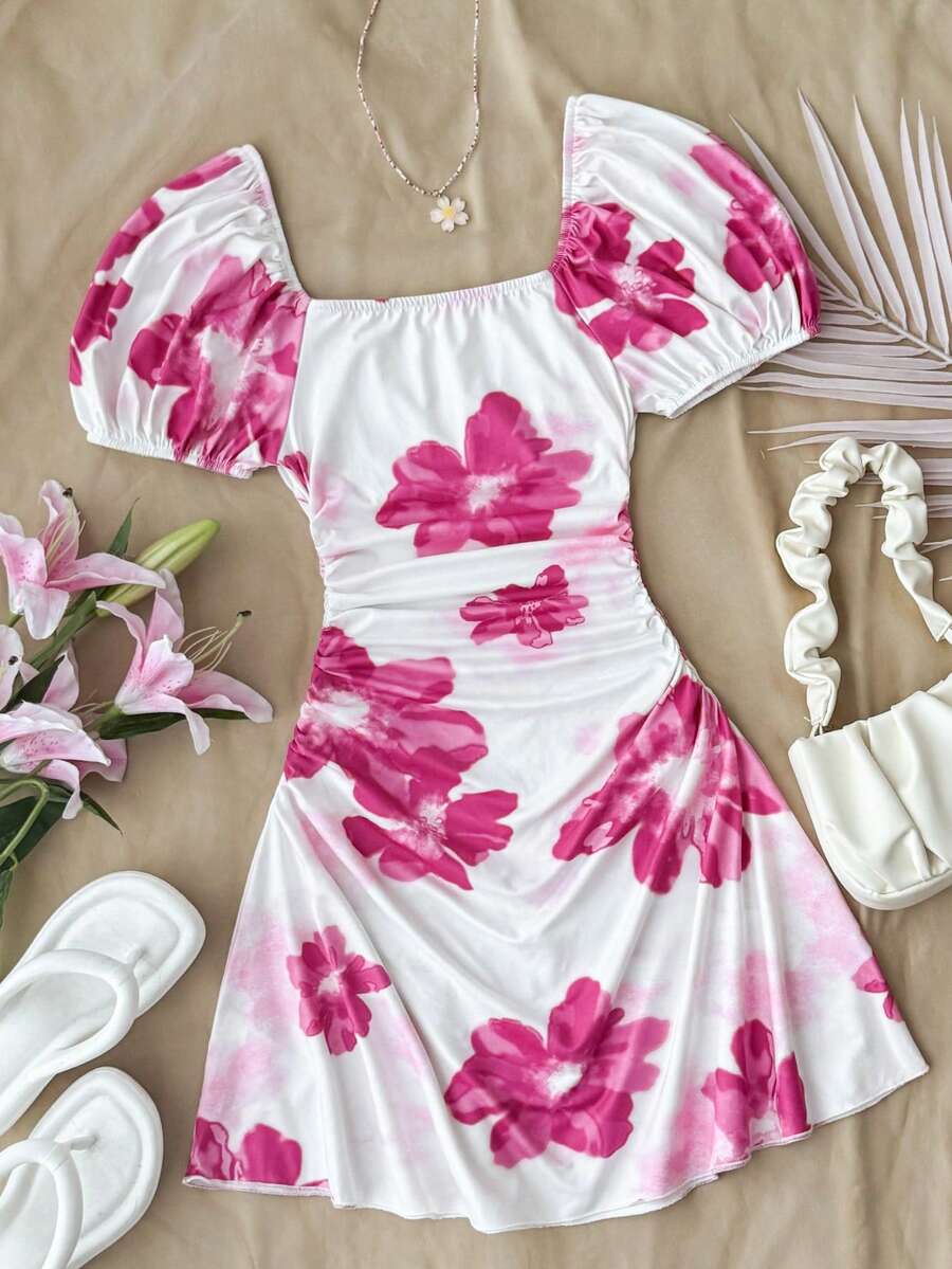 Teen girls red floral print A-line party dress featuring short puff sleeves, square neckline, ruched bust, and contrast lace details.