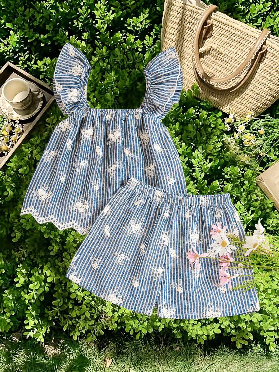 Tween girls 2-piece bohemian outfit set in apricot featuring a square neck embroidered sleeveless camisole top and matching floral wide leg shorts.
