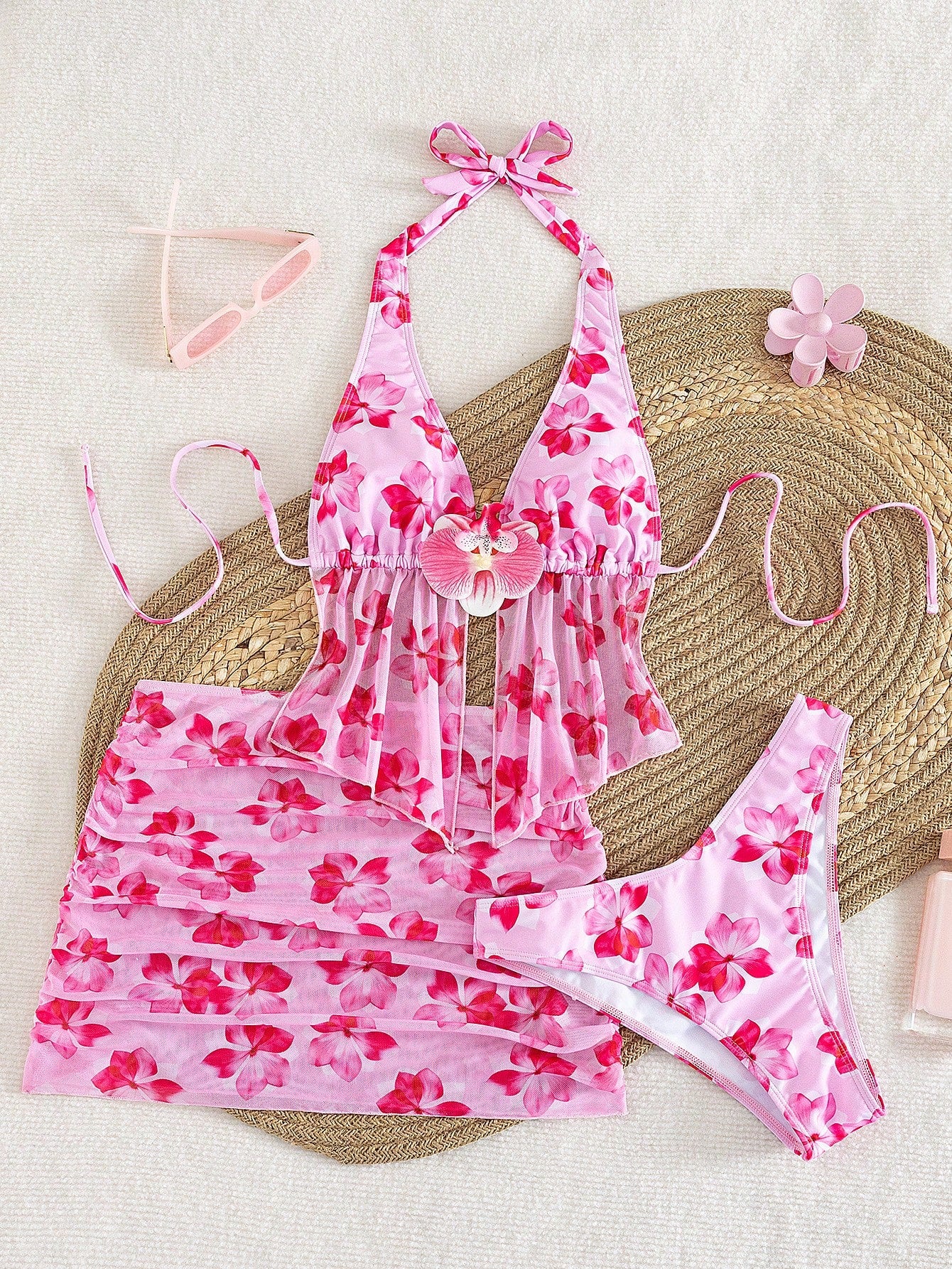 Women's 3-piece floral bikini set featuring a multicolor plant print halter top with 3D rose detail, matching bikini bottoms, and short skirt cover-up