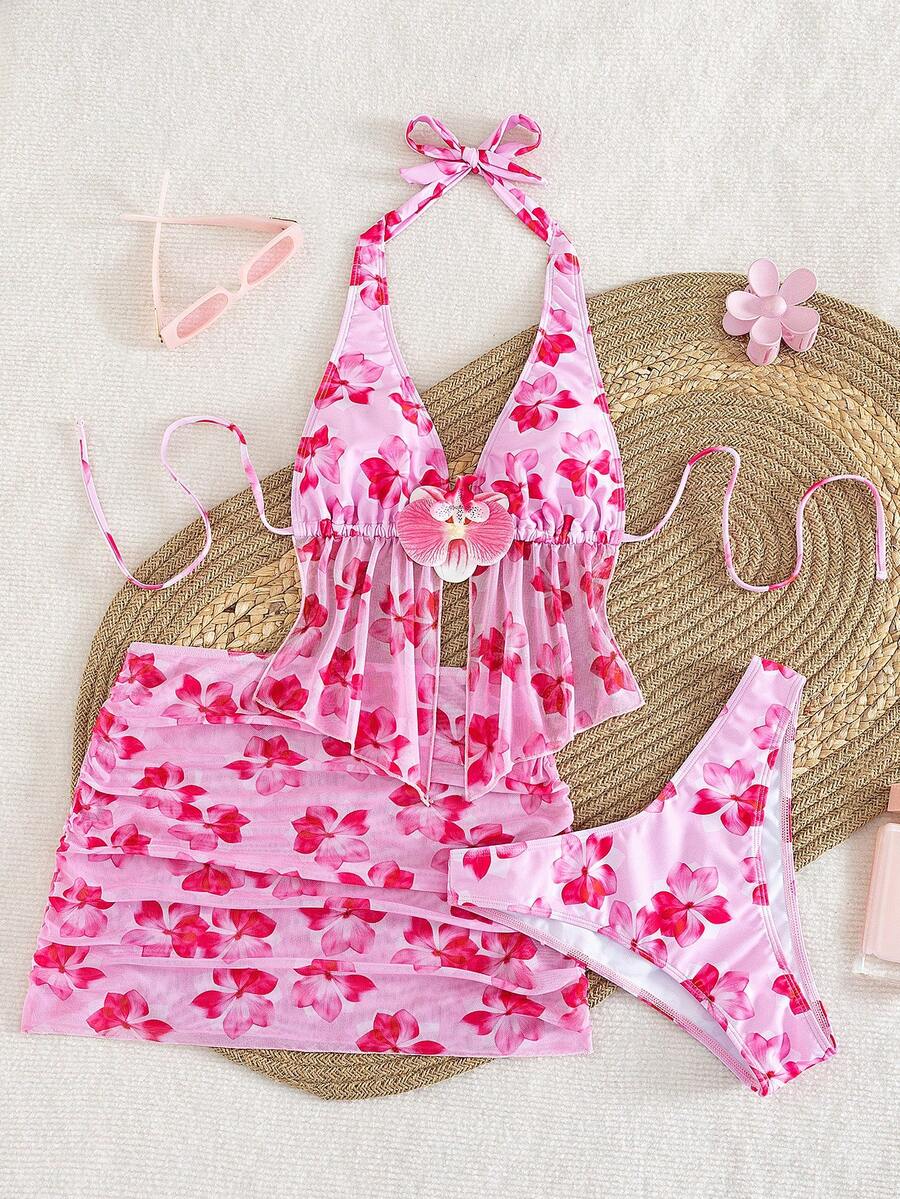 Women's 3-piece floral bikini set featuring a multicolor plant print halter top with 3D rose detail, matching bikini bottoms, and short skirt cover-up