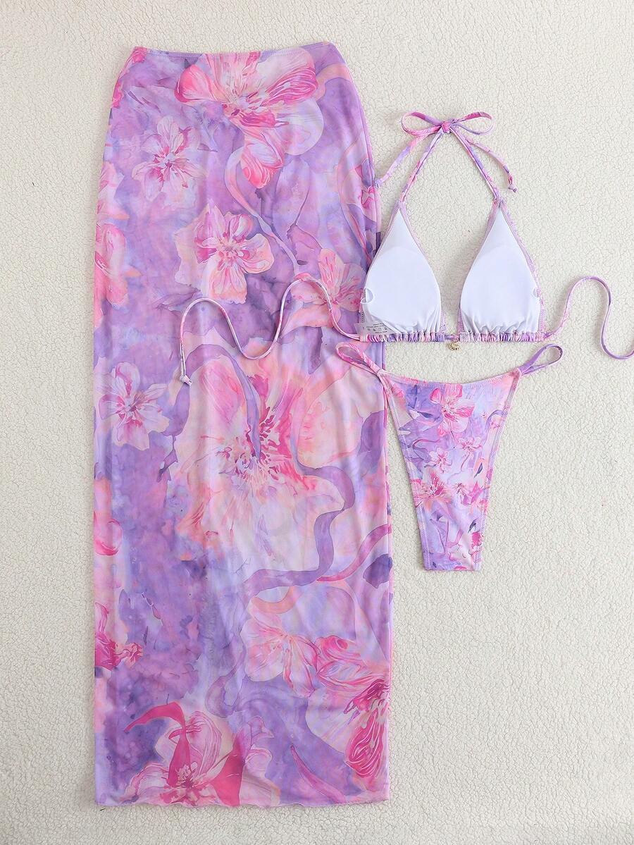 Women's 3-piece floral swimsuit set featuring a multicolor tie-back halter bikini top, low-waist bottoms, and a matching sheer mesh maxi skirt.