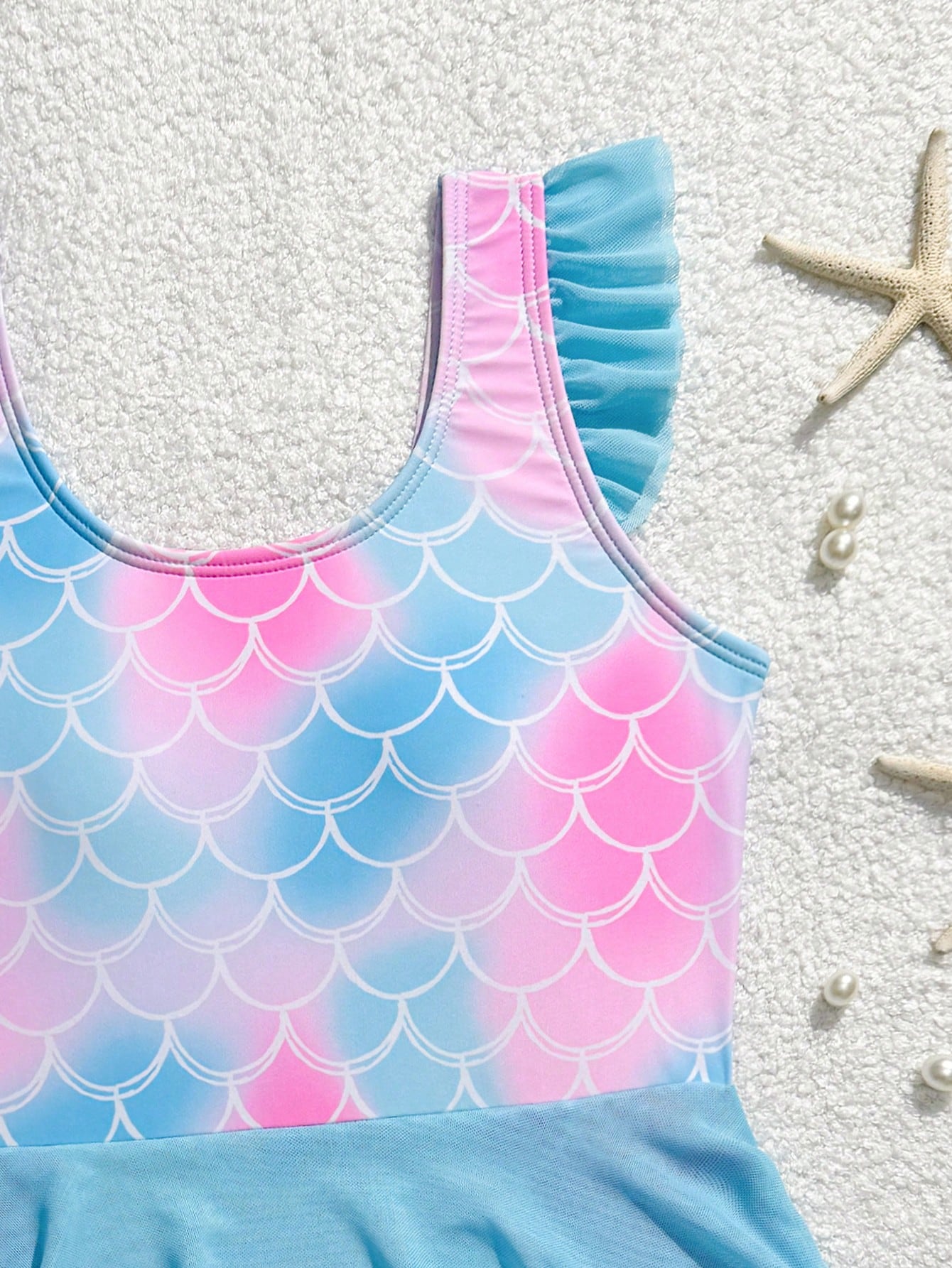 Tween girl one-piece swimsuit with multicolor fish scale graphic print, ruffle details, contrast mesh, round neck, and skirt bottom for beach or pool wear