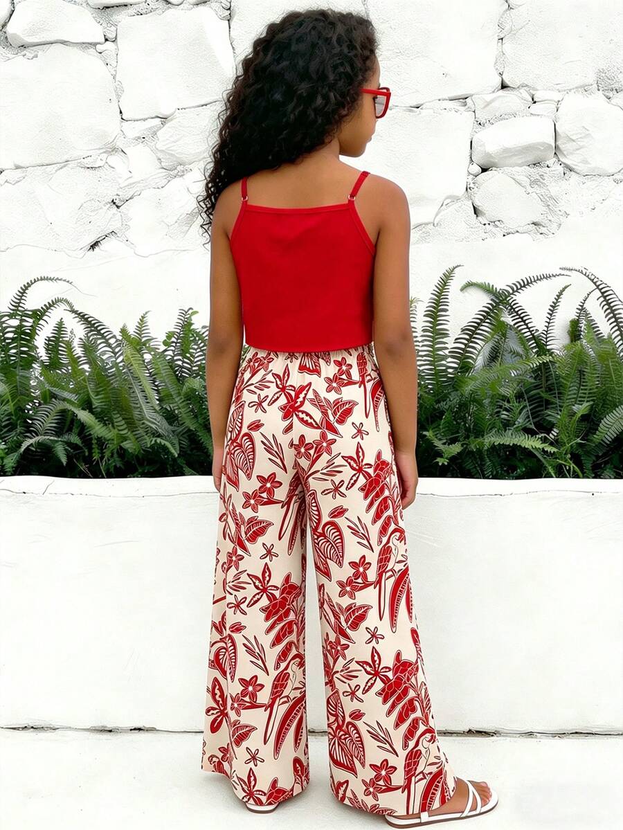 Tween girls blue 2-piece vacation outfit set featuring a tiered ruffle spaghetti strap camisole and loose high-waist pants.