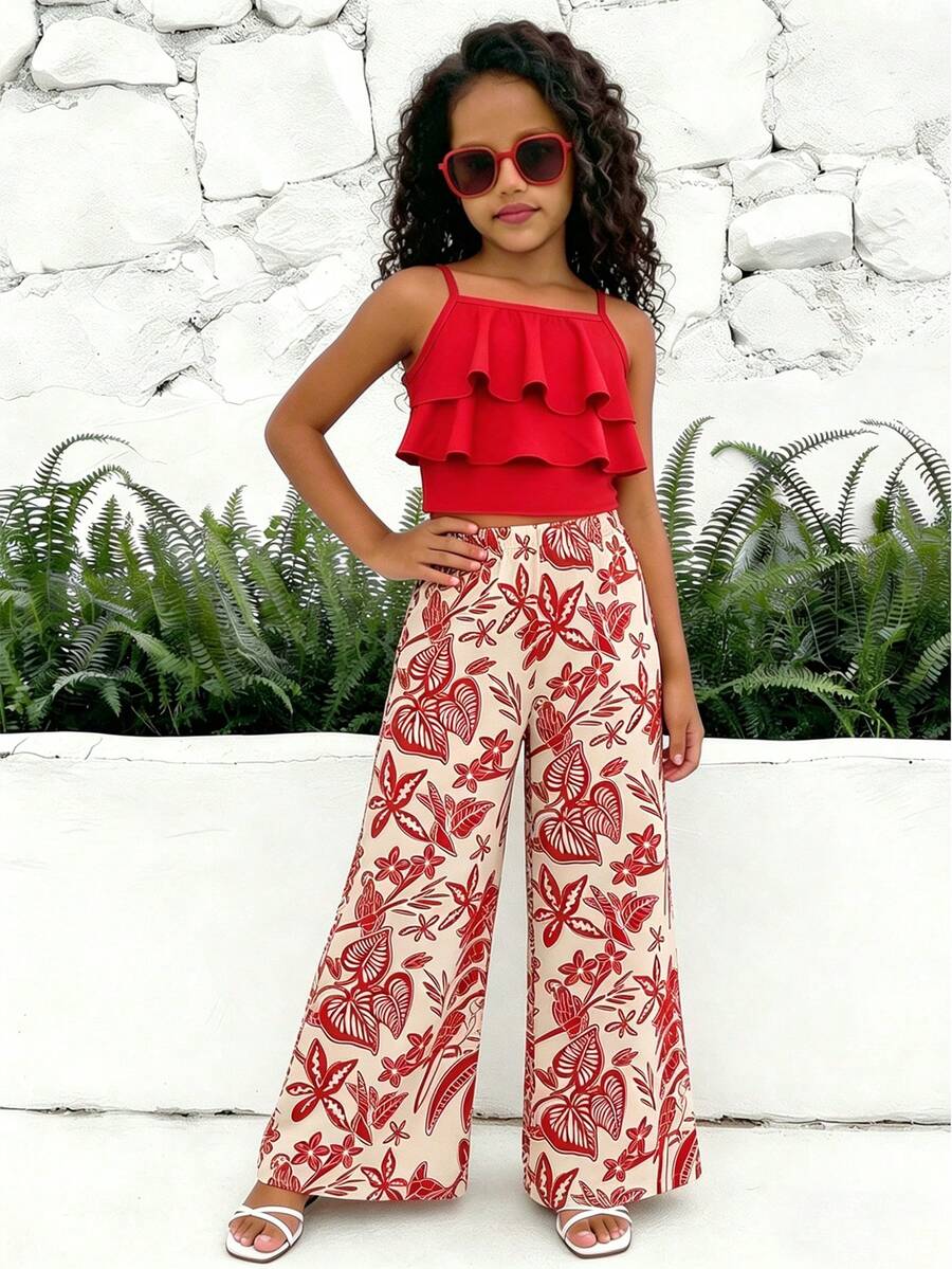 Tween girls blue 2-piece vacation outfit set featuring a tiered ruffle spaghetti strap camisole and loose high-waist pants.