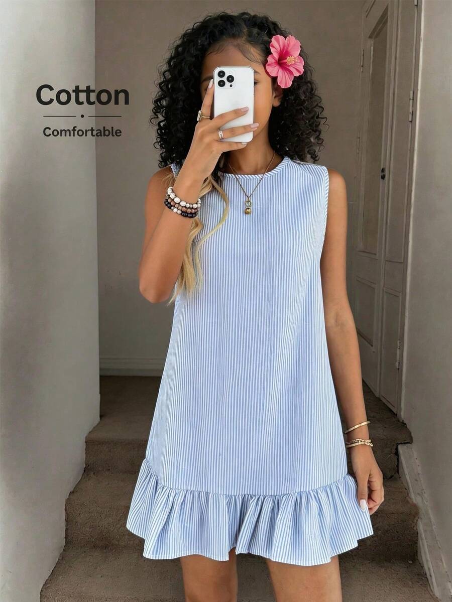 Tween girls casual leopard print smock mini dress featuring a round neck and flounce ruffle hem.