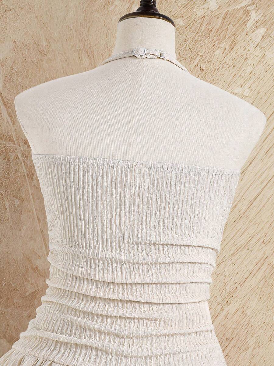 Tween girls apricot sleeveless halter mini dress with textured starfish and shell decor, shirred tiered layer, high waist, and flounce hem.