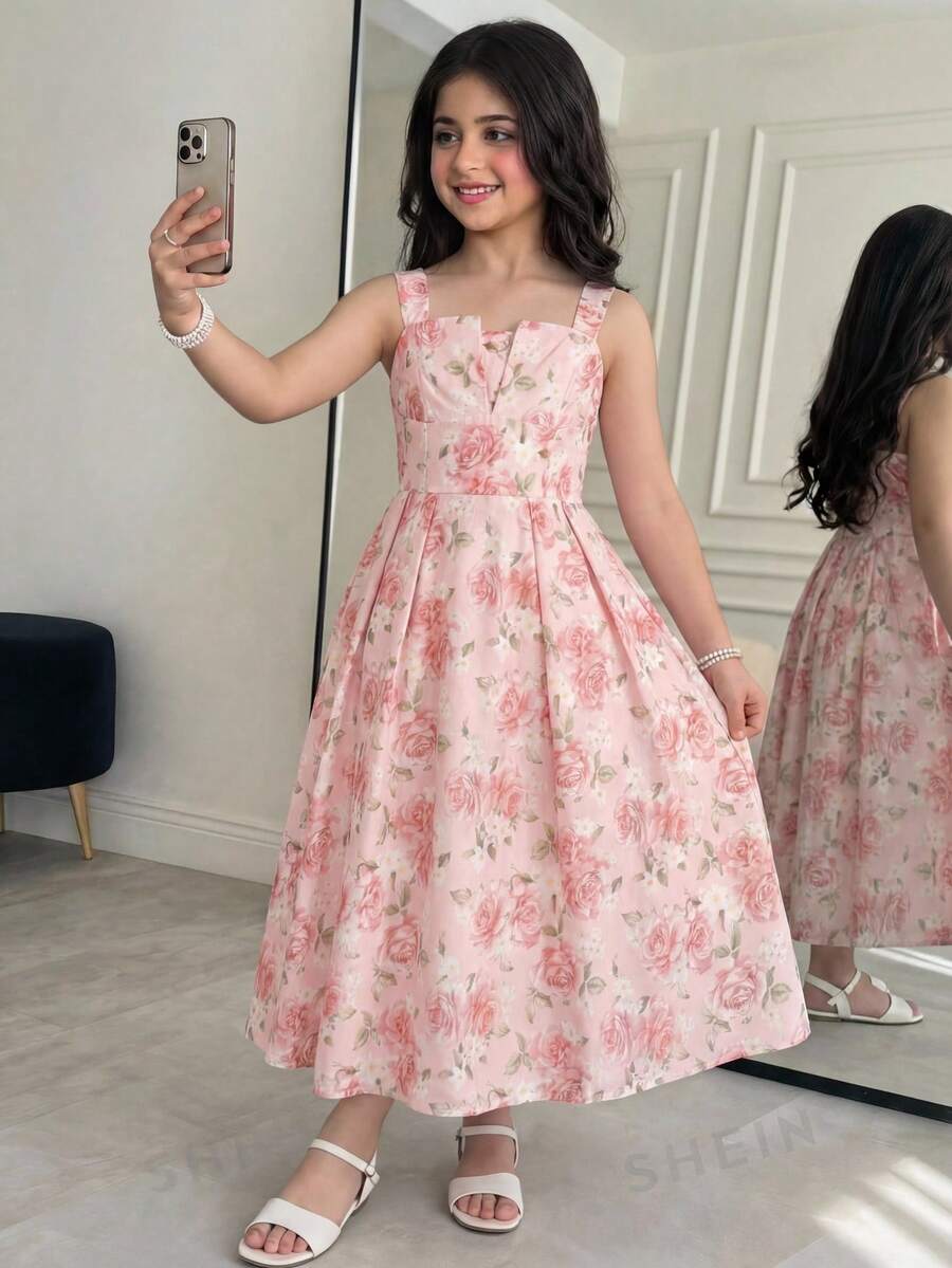 Tween girl apricot floral print midi dress with ruffle shoulder straps, shirred detail, and high waist A-line fit.