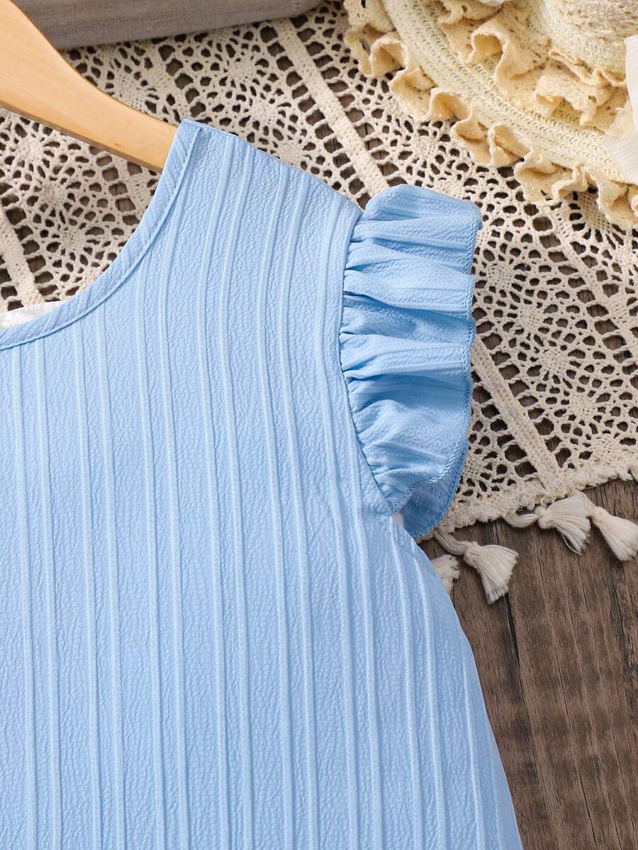 Tween girls apricot vacation midi dress featuring a round neck, cut out details, ruffle flounce accents, and geometric pattern.