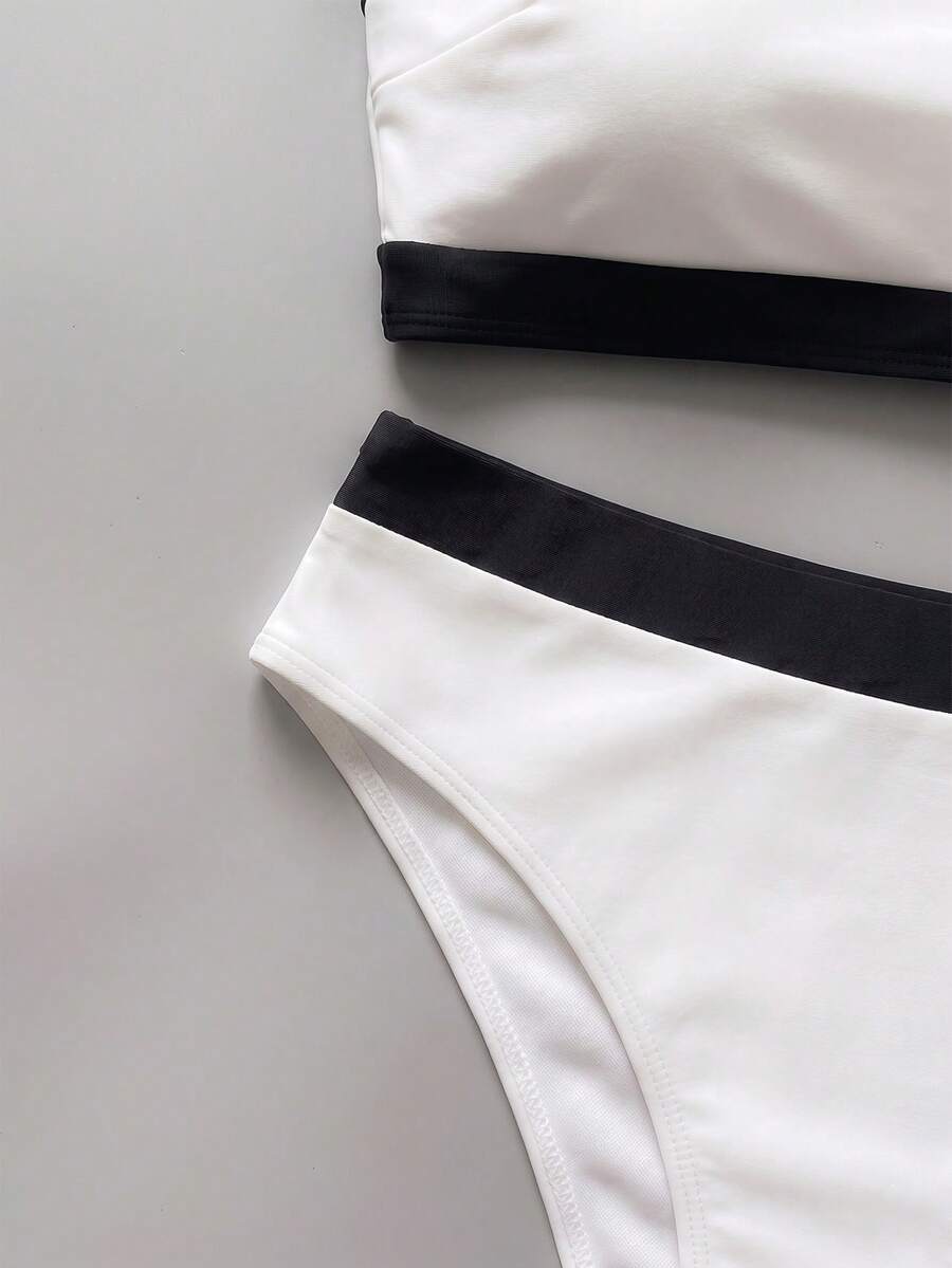 Women's bandeau bikini swimwear set featuring detachable shoulder straps, removable padding, wireless cups, and low-waist bottoms.