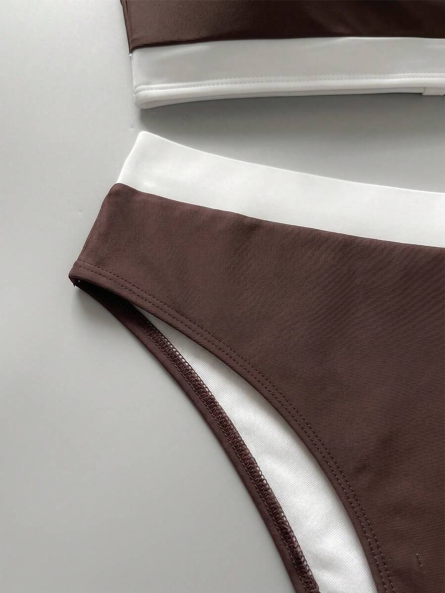 Women's bandeau bikini swimwear set featuring detachable shoulder straps, removable padding, wireless cups, and low-waist bottoms.