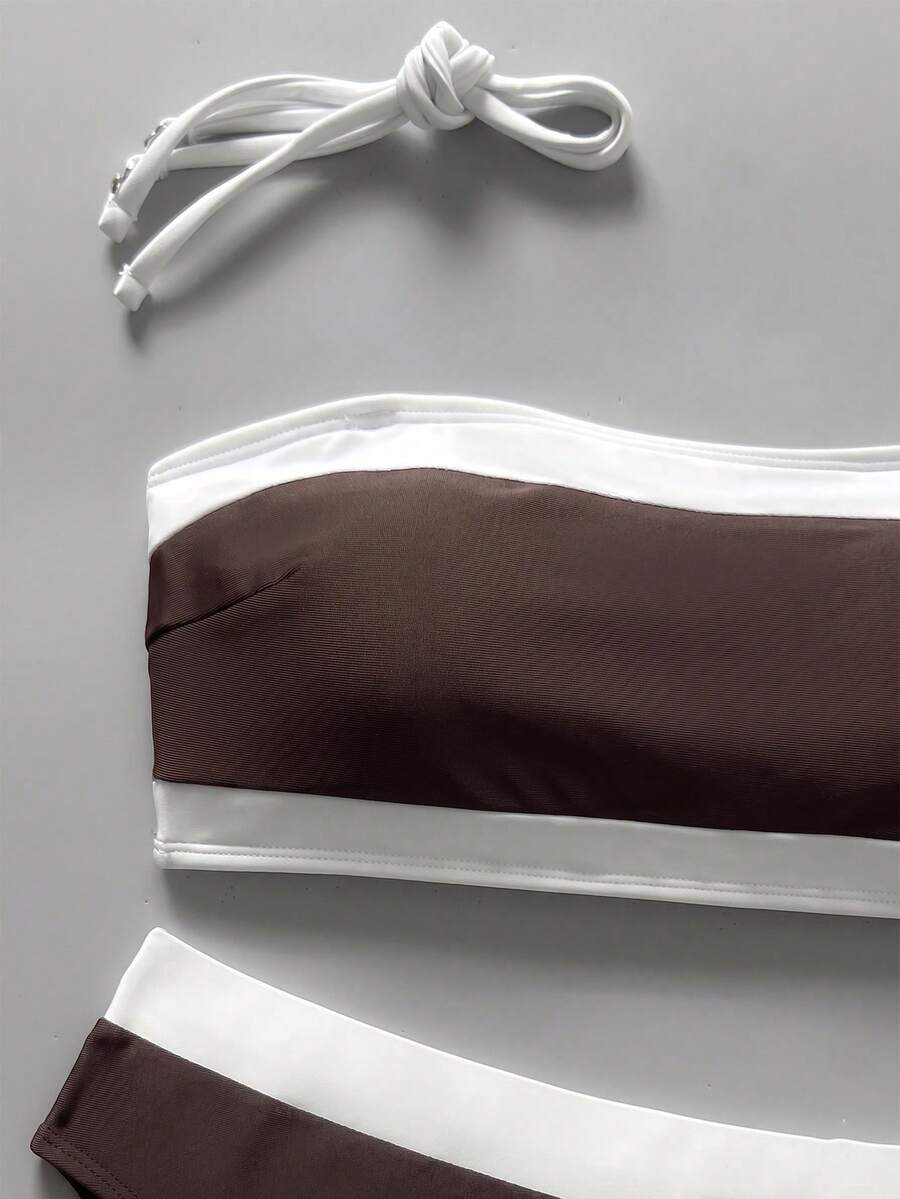 Women's bandeau bikini swimwear set featuring detachable shoulder straps, removable padding, wireless cups, and low-waist bottoms.