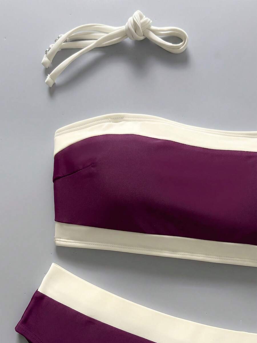 Women's bandeau bikini swimwear set featuring detachable shoulder straps, removable padding, wireless cups, and low-waist bottoms.