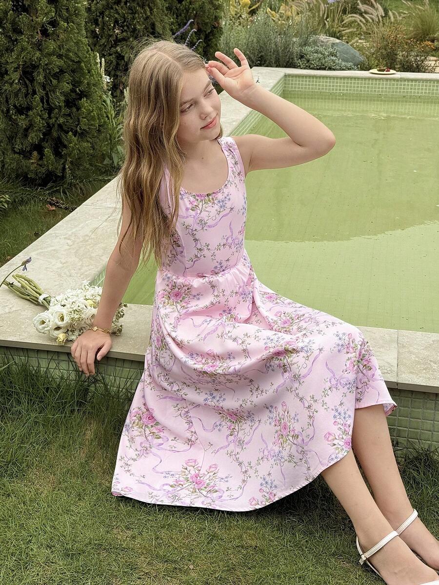 Tween girls pink floral sleeveless A-line midi dress featuring round neck, high waist with belt, contrast lace, and zipper back.