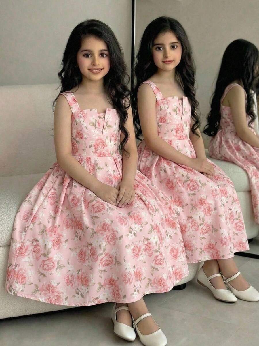 Tween girl apricot floral print midi dress with ruffle shoulder straps, shirred detail, and high waist A-line fit.