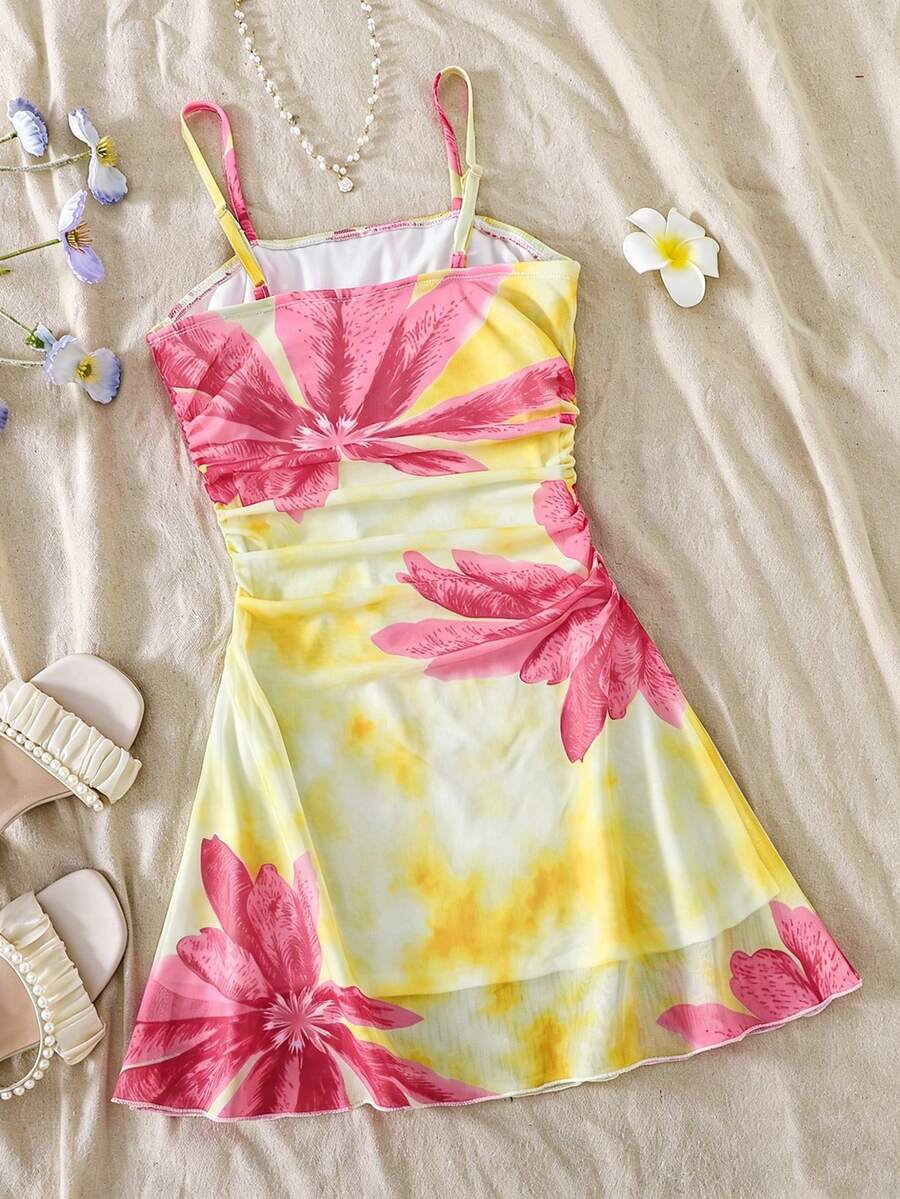 Apricot tween girls sleeveless halter cami dress with appliques, bow front, zipper detail, high waist, flared hem, and short slim fit design.