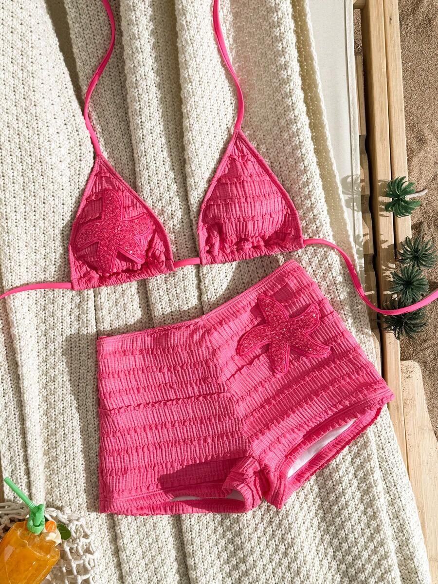 Women's apricot two-piece swimsuit set with a halter tie-back top and matching high stretch shorts.