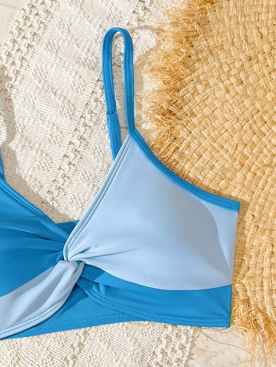 Tween girls multicolor striped 2-piece bikini set with spaghetti strap top, twist detail, and short high-waist or mid-waist swim bottoms for beach and pool wear.