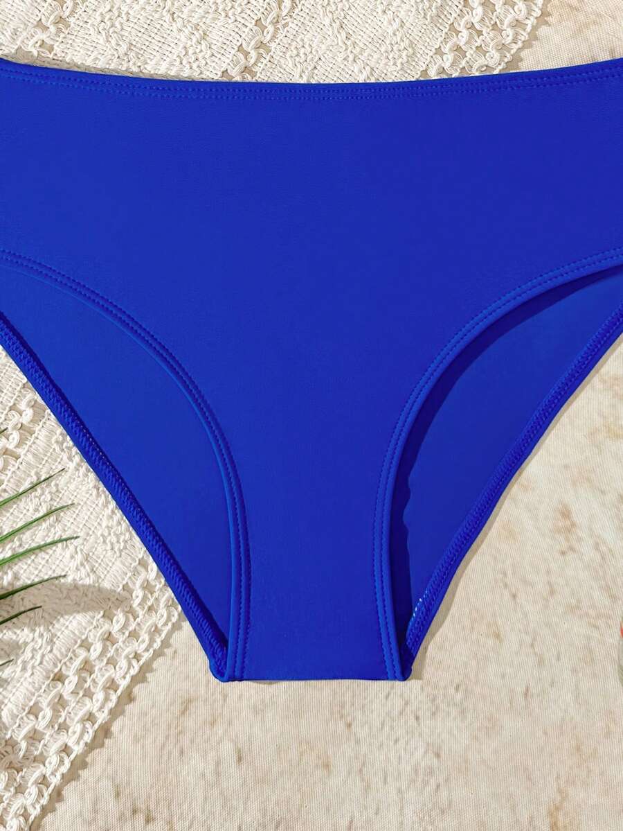 Tween girls multicolor striped 2-piece bikini set with spaghetti strap top, twist detail, and short high-waist or mid-waist swim bottoms for beach and pool wear.