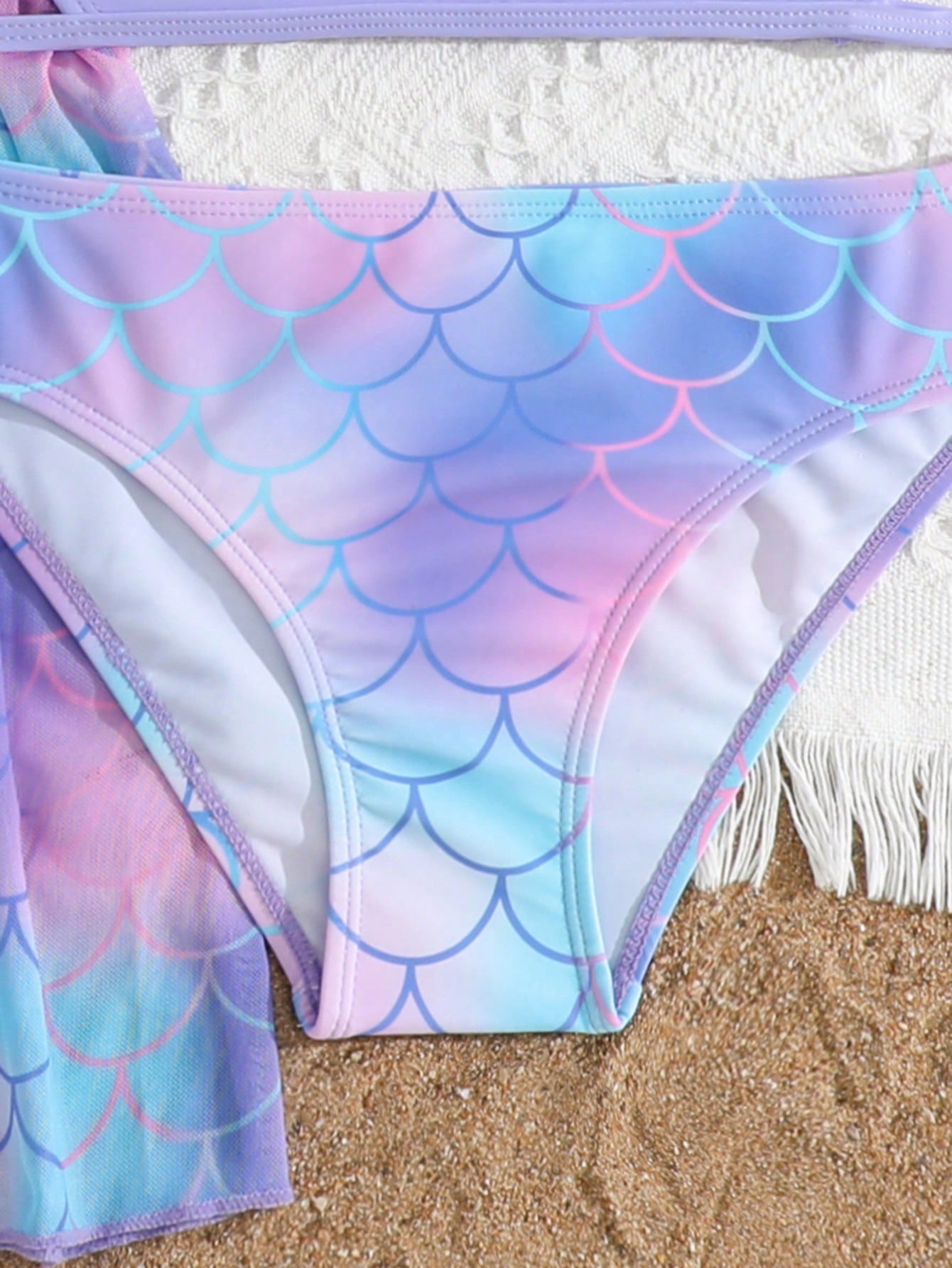 Tween girls 3-piece striped swimwear set featuring a tankini top, mid-waist bikini bottoms with a drawstring waist, and a matching kimono cover-up for beach or vacation wear.