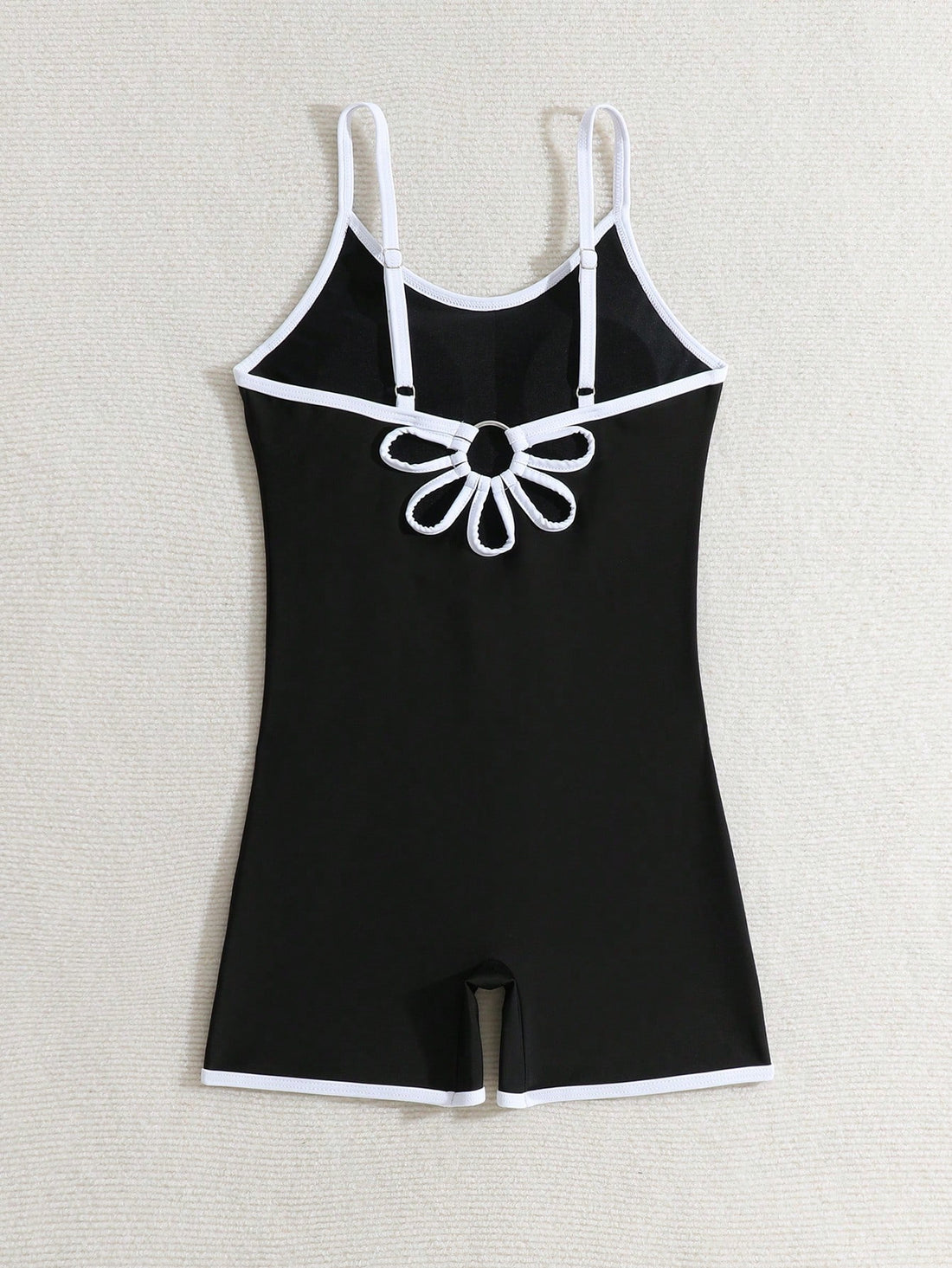 Tween girls colorblock camisole romper swimsuit with spaghetti straps, appliques, all-over print, fitted short silhouette, and medium-stretch fabric for beach, pool, and vacation wear.