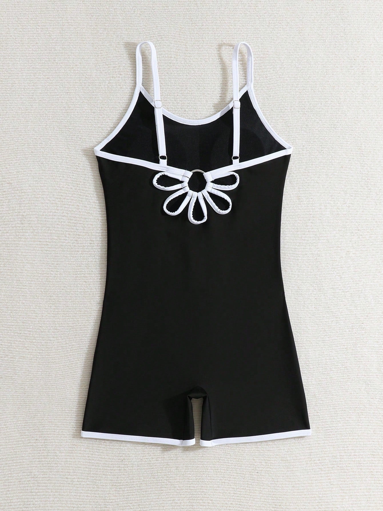 Tween girls colorblock camisole romper swimsuit with spaghetti straps, appliques, all-over print, fitted short silhouette, and medium-stretch fabric for beach, pool, and vacation wear.