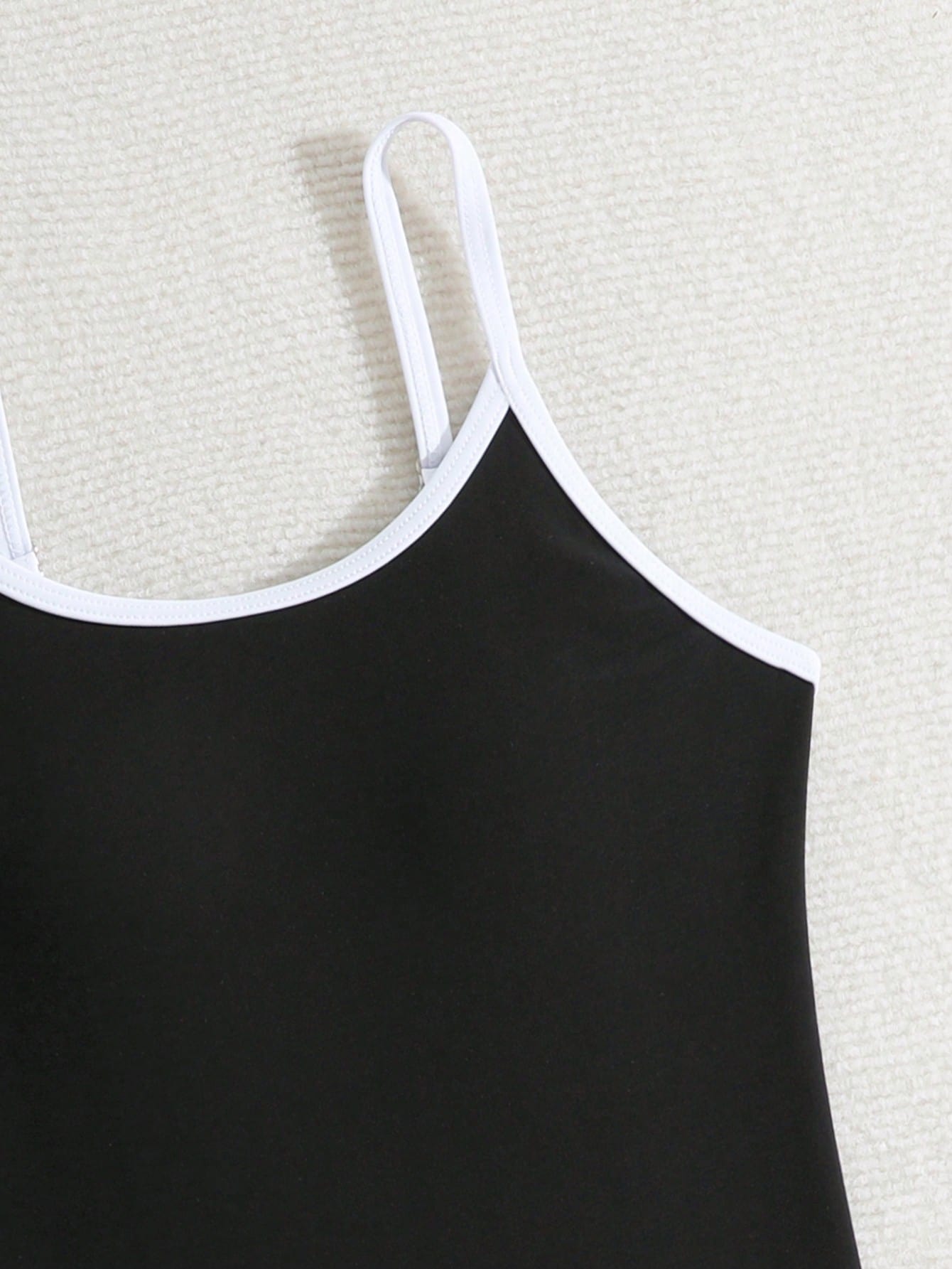 Tween girls colorblock camisole romper swimsuit with spaghetti straps, appliques, all-over print, fitted short silhouette, and medium-stretch fabric for beach, pool, and vacation wear.