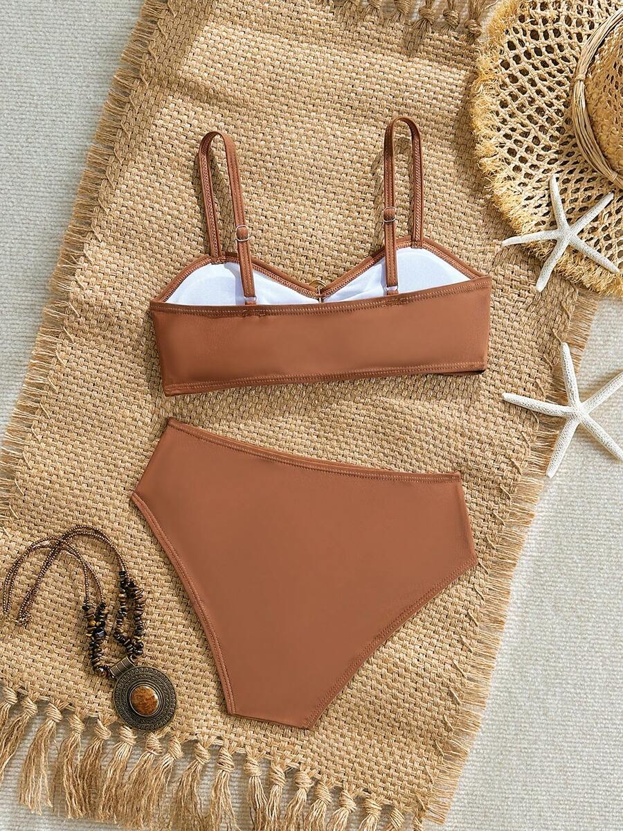 Tween girls pink and white striped two-piece bikini set with spaghetti strap bandeau top, starfish decor, and high waist swim bottoms for beach and vacation wear