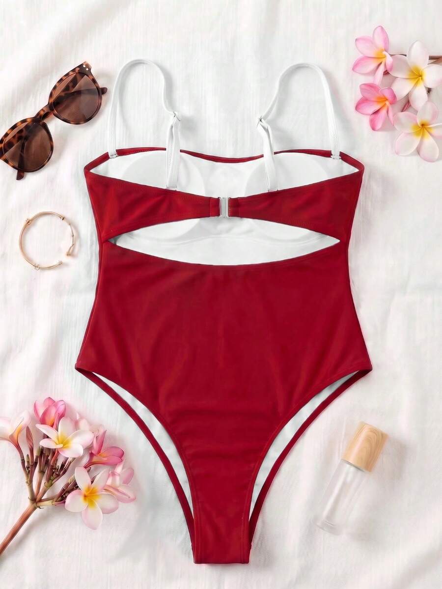 Black colorblock women's one-piece swimsuit with spaghetti straps and high stretch fabric.
