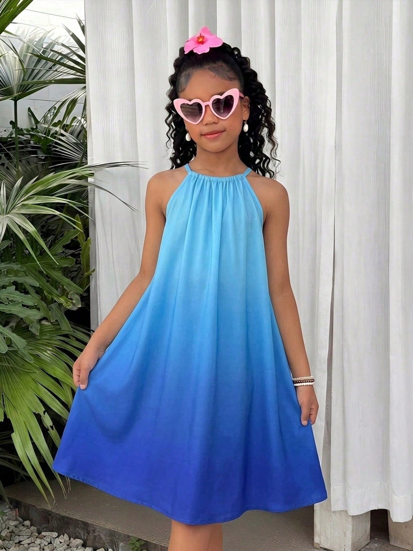 Tween girls floral halter neck sleeveless tunic dress with button detail, plant pattern, loose fit, short length, and vacation style for casual summer wear.