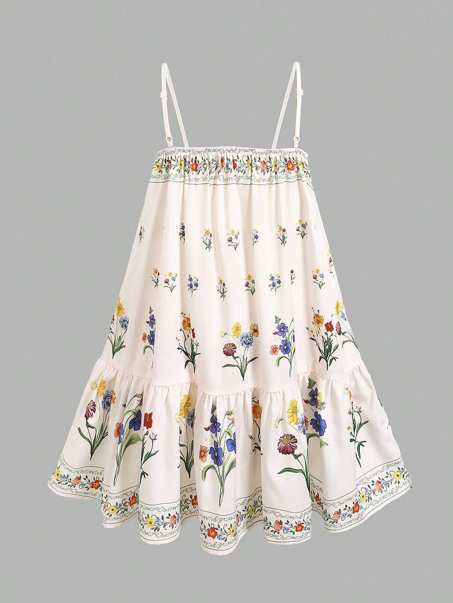 Green ditsy floral print cami dress for tween girls featuring sleeveless spaghetti straps, a ruched high waist, and a short flared hem.