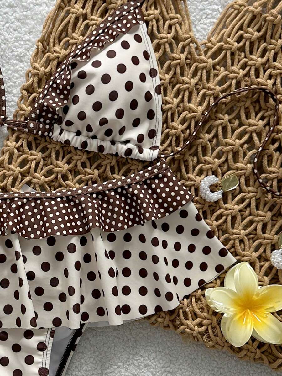 Women's ruffled halter two-piece bikini set with low waist bottoms and wireless triangle cups.
