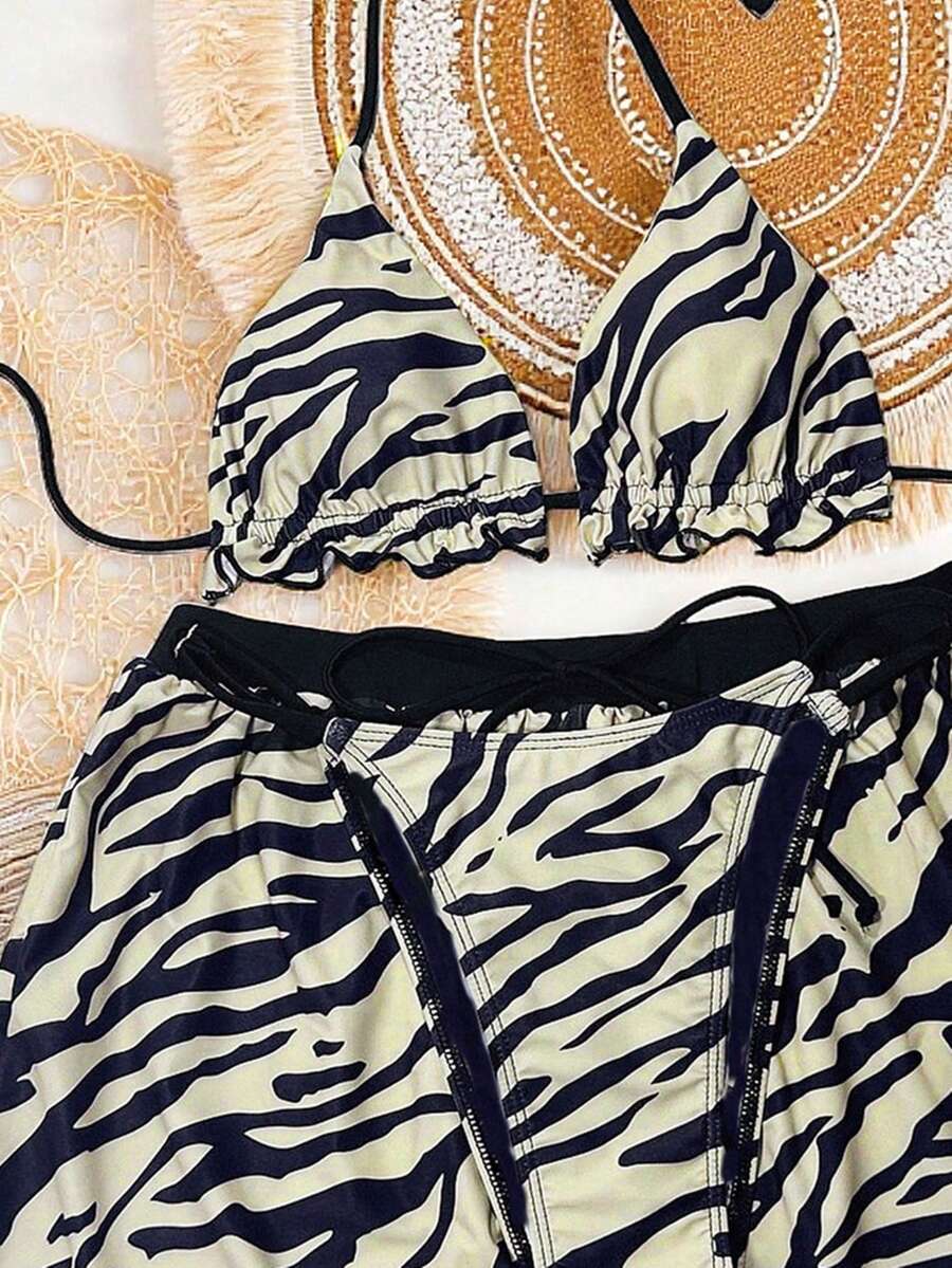 Women's 3-piece frill trim bikini set with halter tie-back top and high waist bottoms.