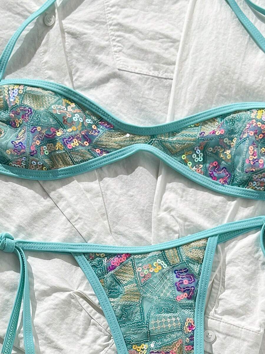 Apricot 2-piece sequin textured halter bikini set featuring a wireless top with lace-up backless ties and matching low-waist side-tie thong bottoms.