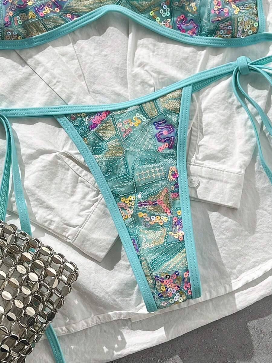 Apricot 2-piece sequin textured halter bikini set featuring a wireless top with lace-up backless ties and matching low-waist side-tie thong bottoms.