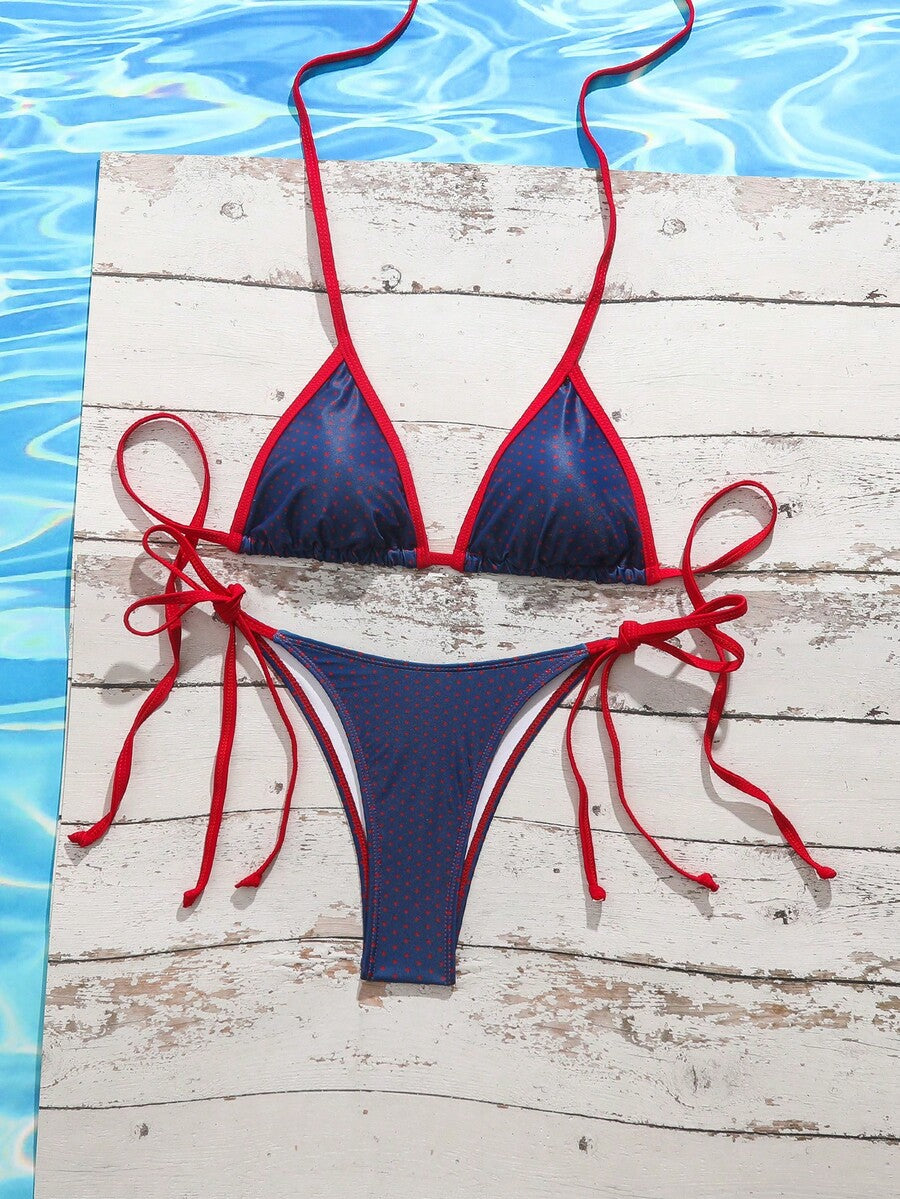 Women's tropical print two-piece halter bikini set featuring wireless triangle cups with tie-back detail and high-waist bikini bottoms.