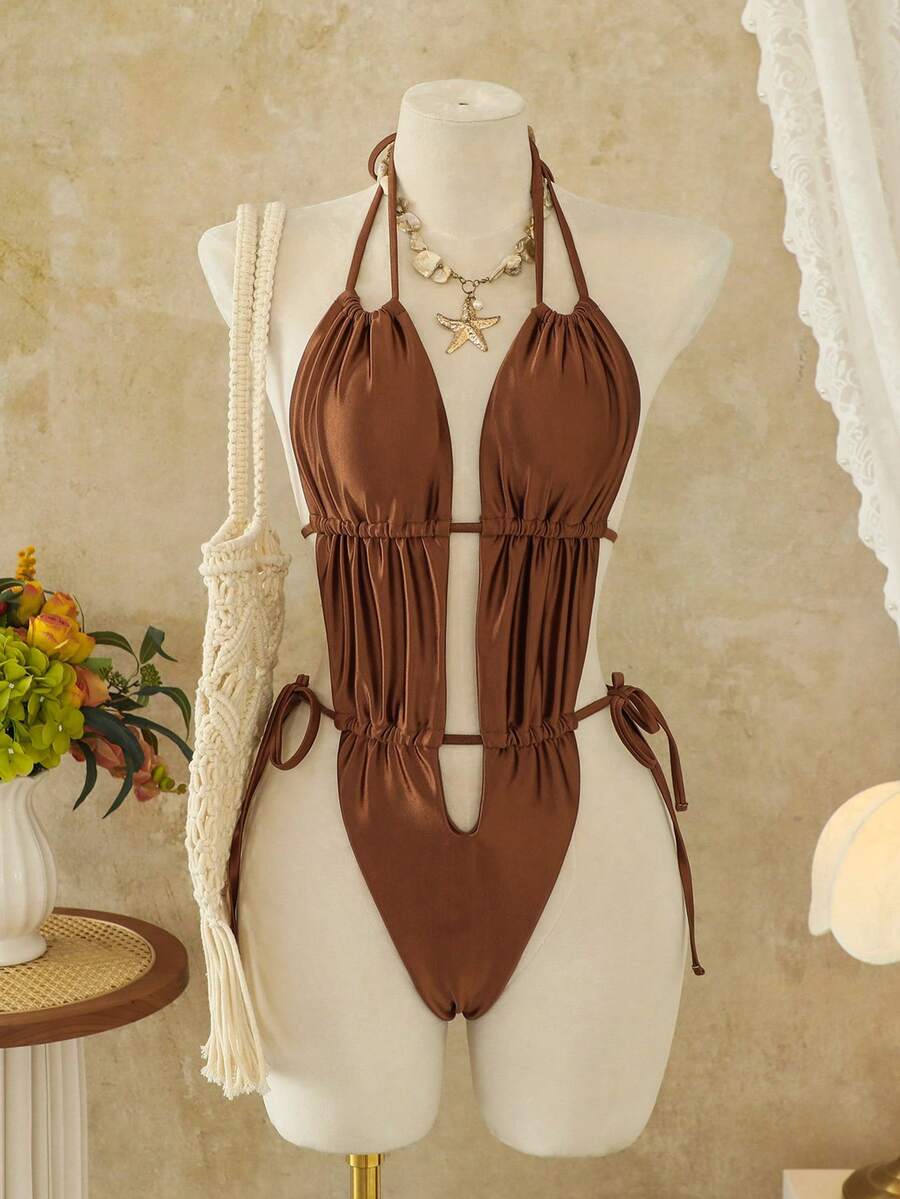 Women's coffee brown halter one-piece monokini swimsuit featuring V-wired cut out detail and high cut leg.