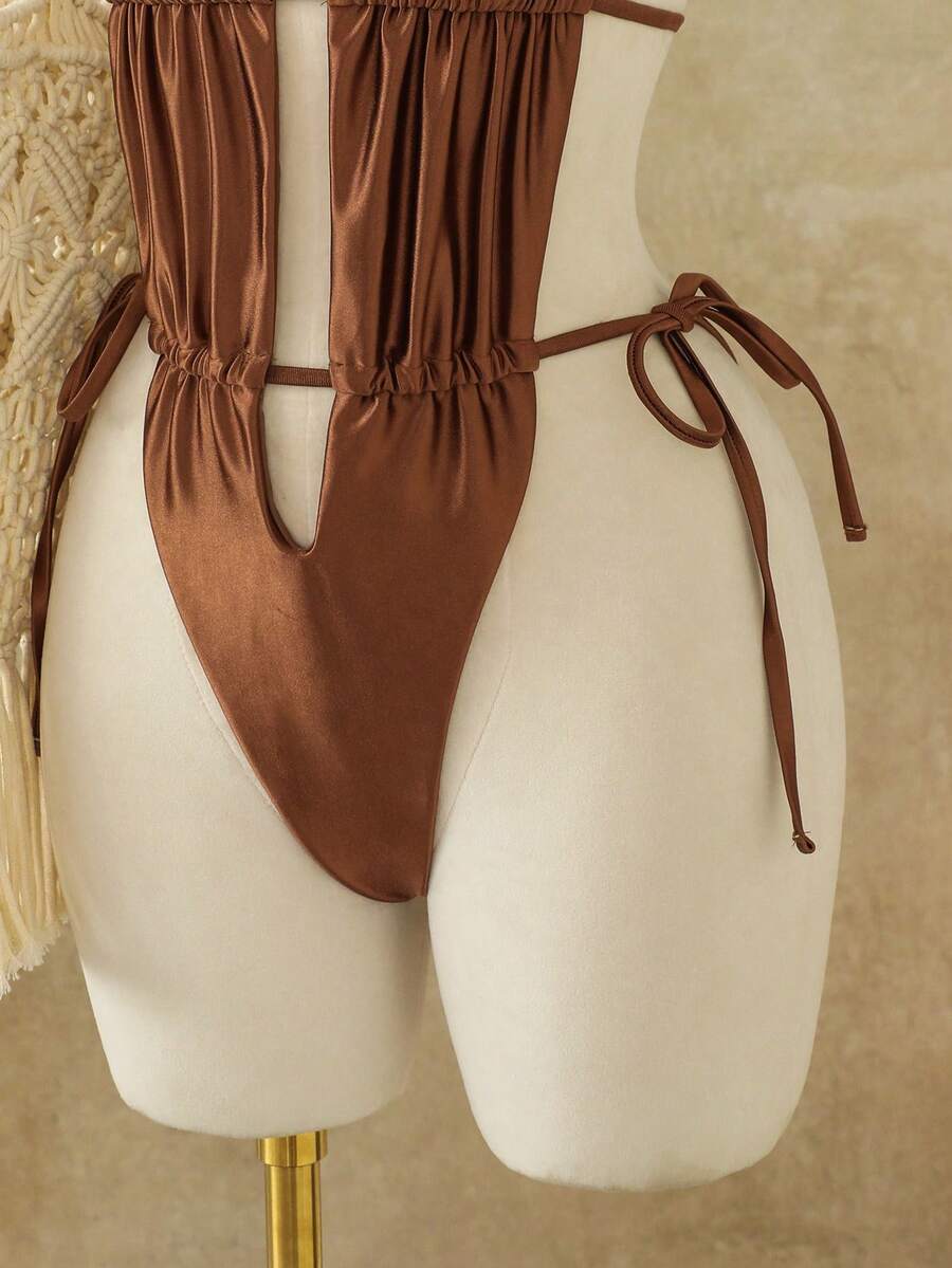 Women's coffee brown halter one-piece monokini swimsuit featuring V-wired cut out detail and high cut leg.